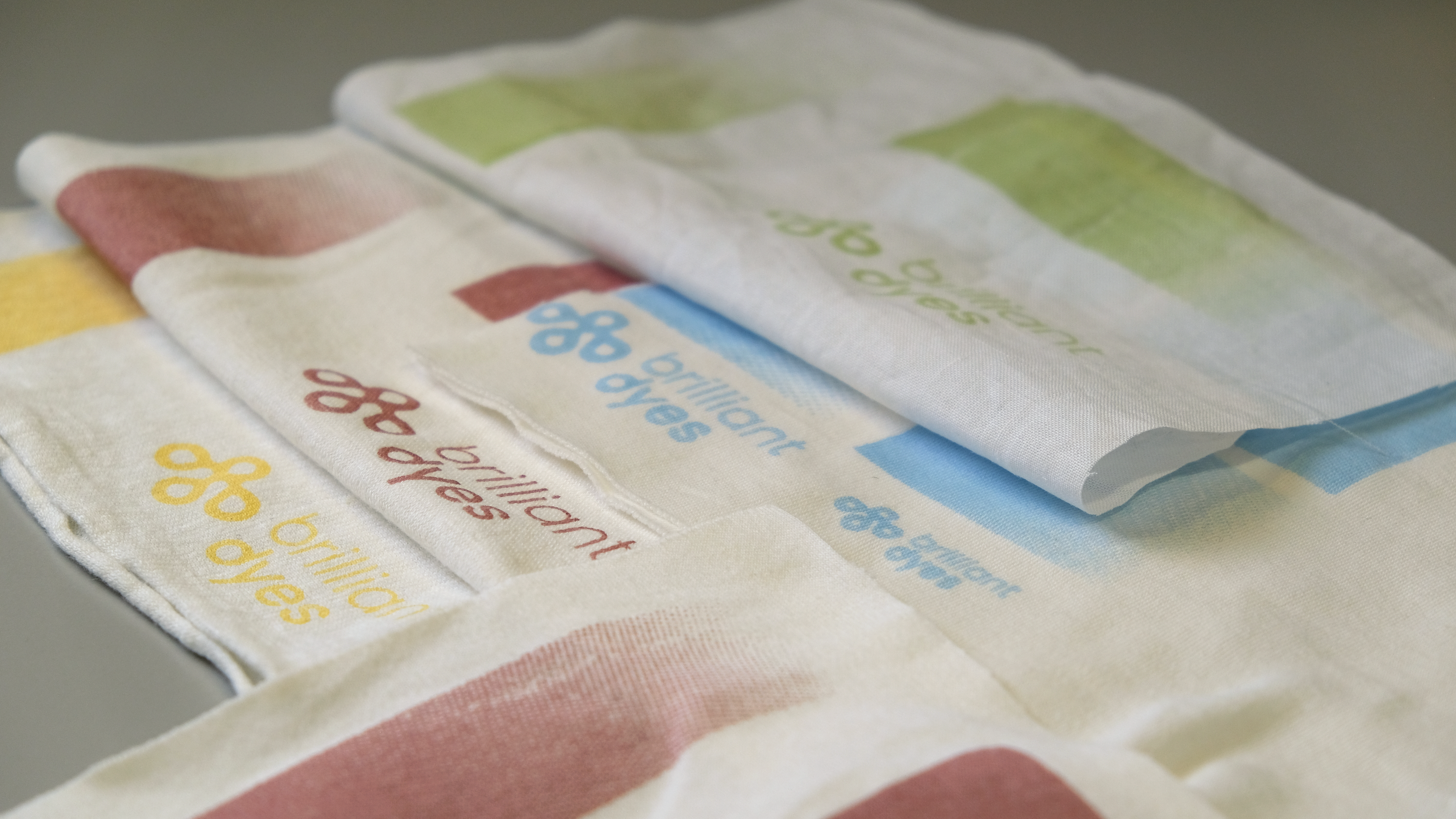 Brilliant Dyes logo in different colours